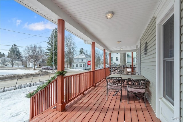 view of snow covered deck