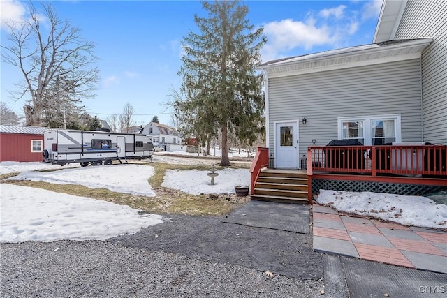 exterior space featuring a wooden deck