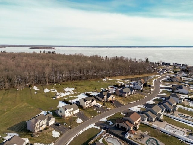 aerial view with a residential view and a water view