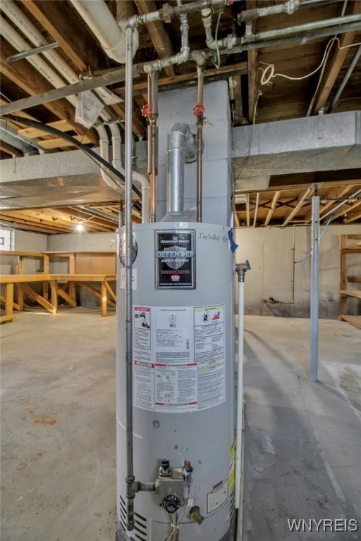 utility room featuring gas water heater