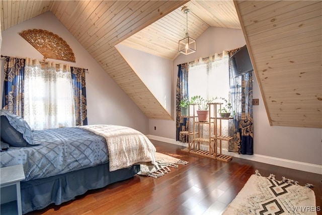 bedroom with vaulted ceiling, wood ceiling, wood finished floors, and baseboards