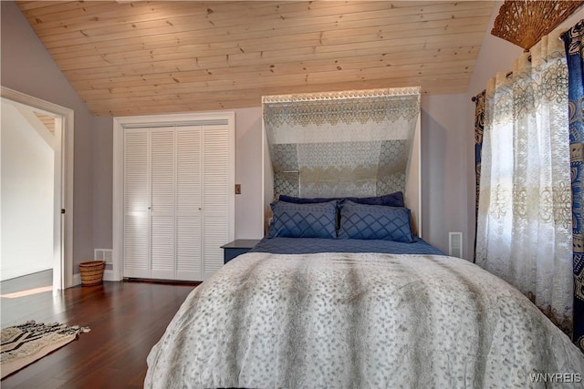 unfurnished bedroom with lofted ceiling, dark wood-style floors, and wooden ceiling