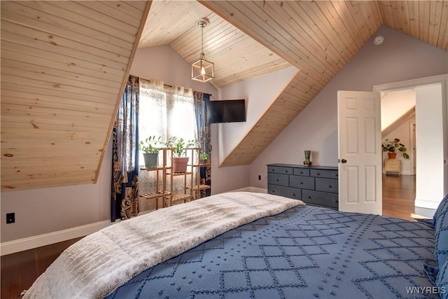 bedroom featuring vaulted ceiling, wood ceiling, and wood finished floors