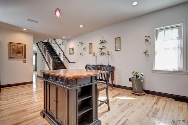 kitchen with recessed lighting, baseboards, light wood-style floors, and open shelves