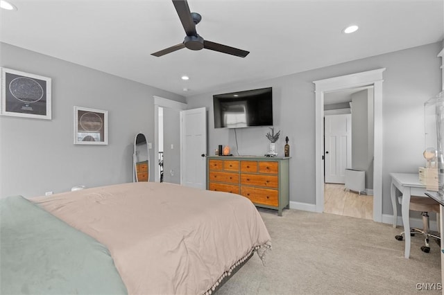 bedroom featuring recessed lighting, baseboards, light carpet, and ceiling fan