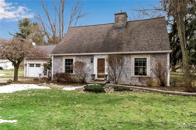 new england style home featuring a front yard, roof with shingles, a chimney, a garage, and stone siding