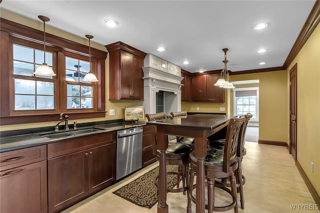 kitchen with dark countertops, crown molding, baseboards, stainless steel dishwasher, and a sink