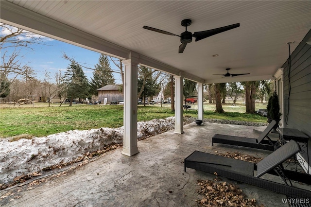 view of patio featuring a ceiling fan