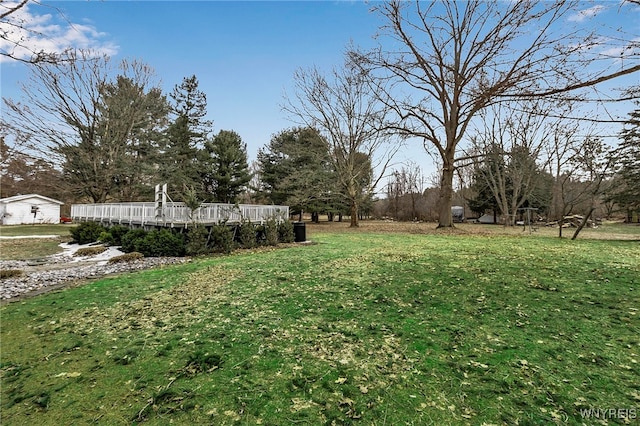 view of yard featuring a deck