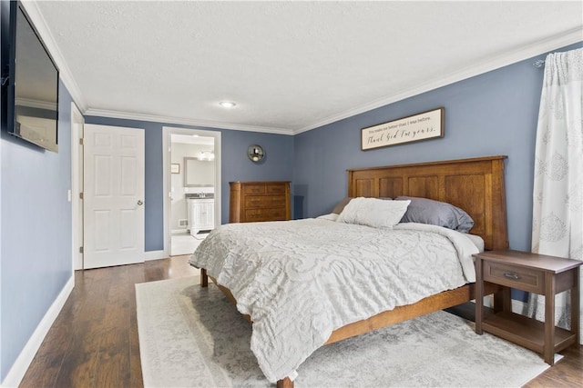 bedroom featuring dark wood-type flooring, baseboards, ensuite bathroom, and ornamental molding