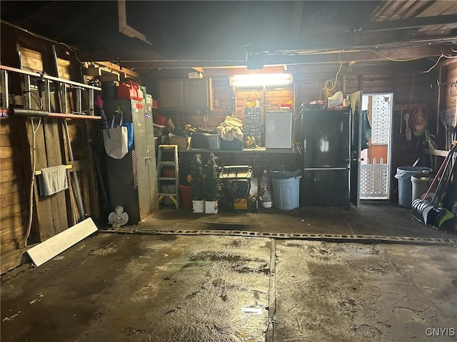 garage with freestanding refrigerator