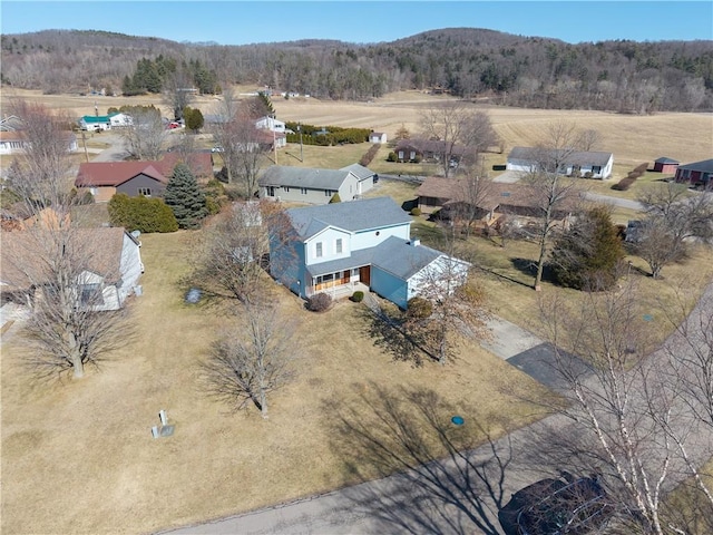 bird's eye view featuring a view of trees