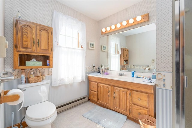 full bathroom with wallpapered walls, toilet, vanity, and a baseboard heating unit