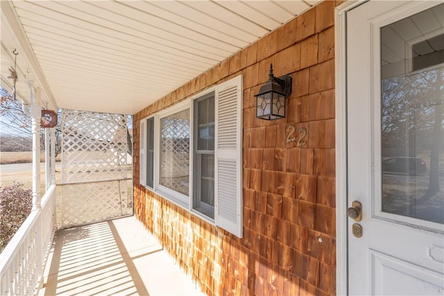 balcony featuring covered porch