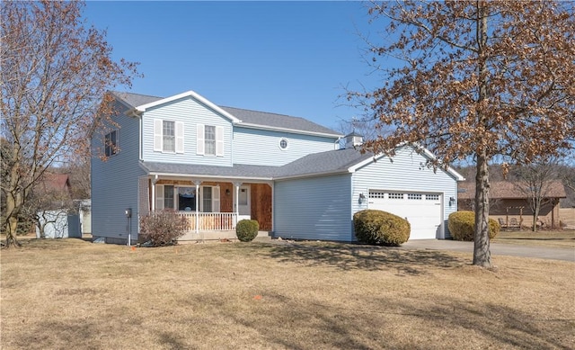 traditional home featuring a shingled roof, a front lawn, a porch, concrete driveway, and an attached garage