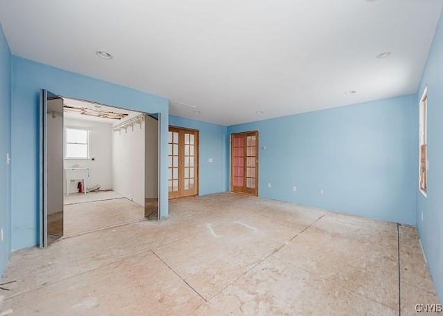 spare room with french doors