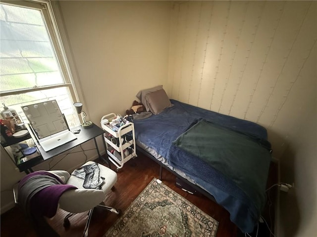 bedroom with wood finished floors