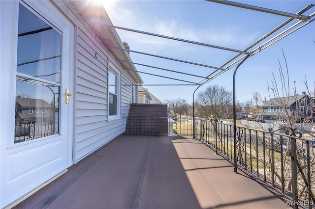 balcony featuring a residential view