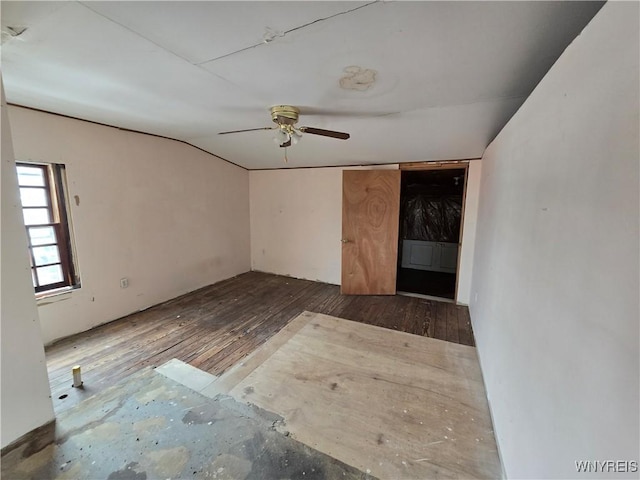 spare room featuring hardwood / wood-style floors and ceiling fan