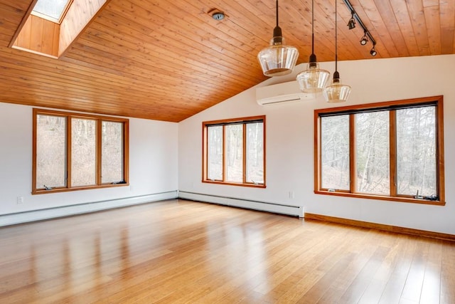 spare room featuring wooden ceiling, hardwood / wood-style flooring, a healthy amount of sunlight, and a wall mounted air conditioner