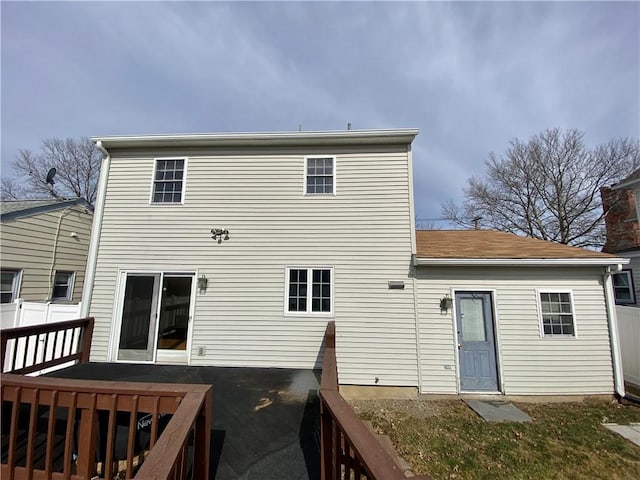 rear view of property with a deck