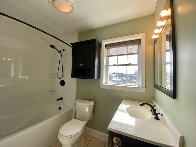 full bath with vanity, baseboards, shower / bath combination, tile patterned floors, and toilet