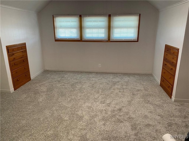 bonus room with lofted ceiling, carpet flooring, and baseboards