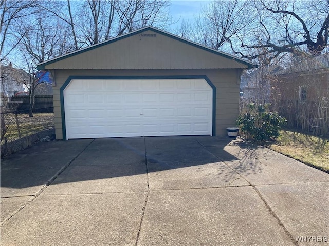 detached garage with fence