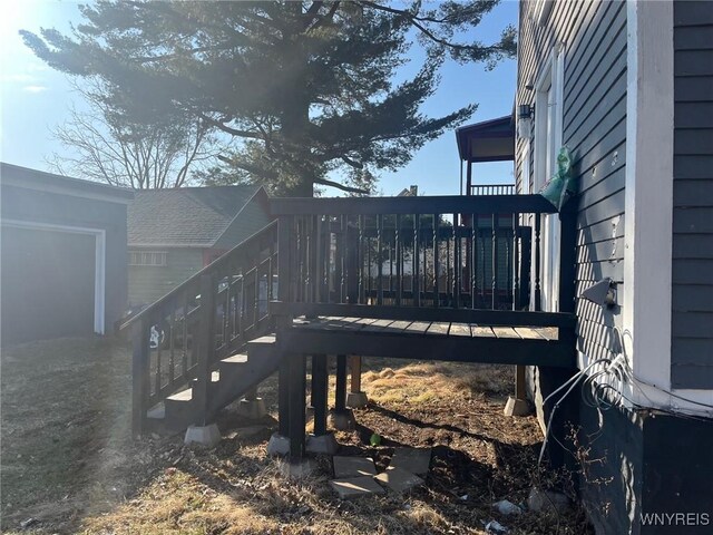 wooden terrace featuring stairs