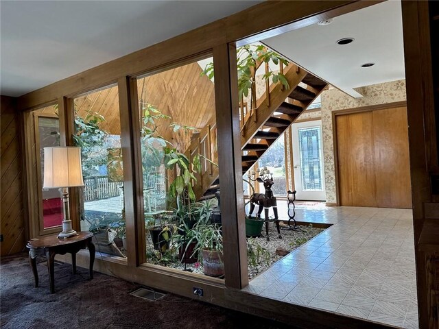 entryway featuring stairs