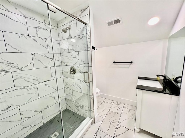 bathroom with visible vents, toilet, marble finish floor, a stall shower, and vanity