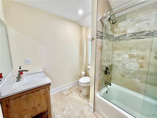 full bath featuring vanity, baseboards, vaulted ceiling, shower / bathing tub combination, and toilet