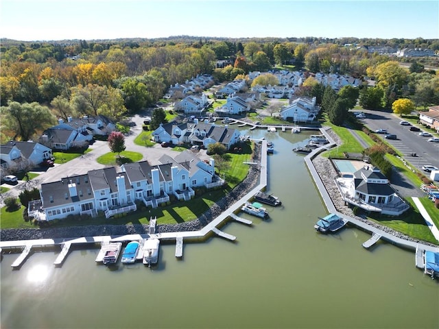 aerial view with a residential view and a water view