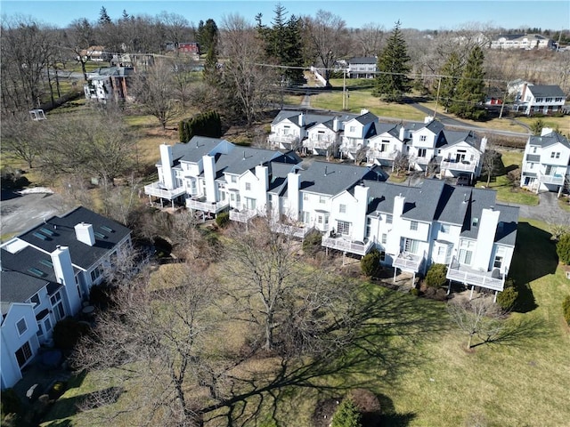 birds eye view of property with a residential view