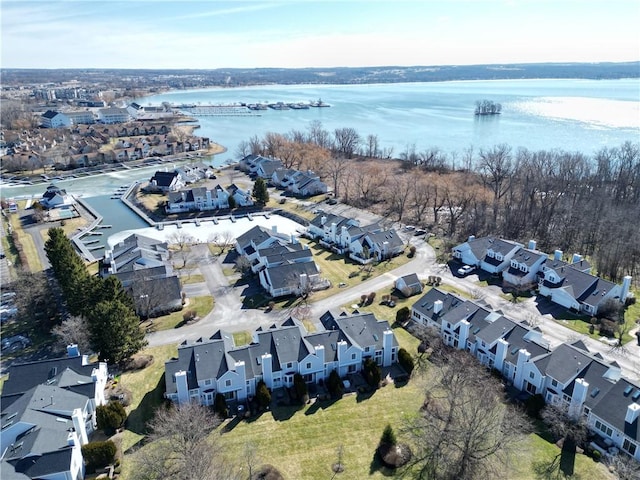 aerial view with a residential view and a water view