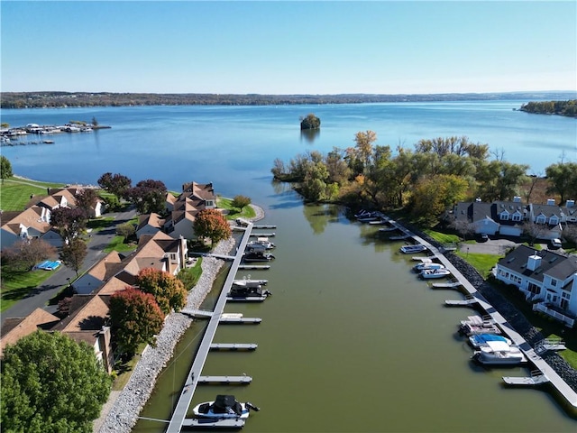 aerial view with a residential view and a water view