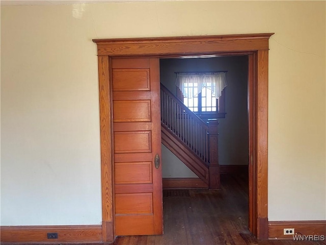 room details with wood finished floors and baseboards