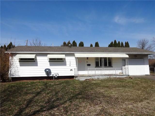 ranch-style house featuring a porch, an attached garage, a front yard, and roof with shingles