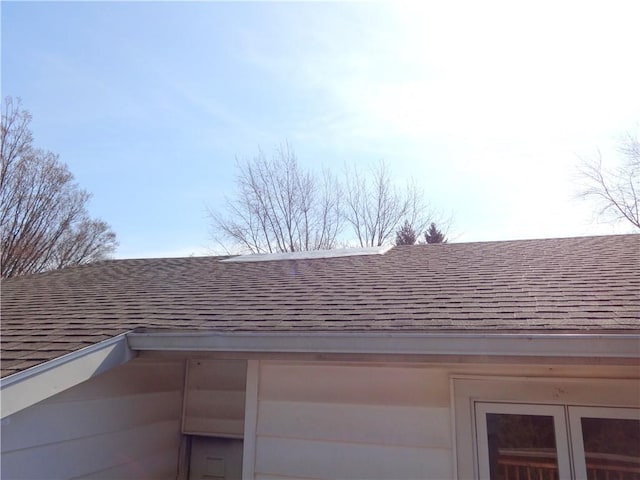 details featuring a shingled roof