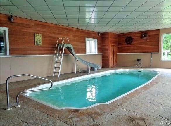 indoor pool featuring a water slide