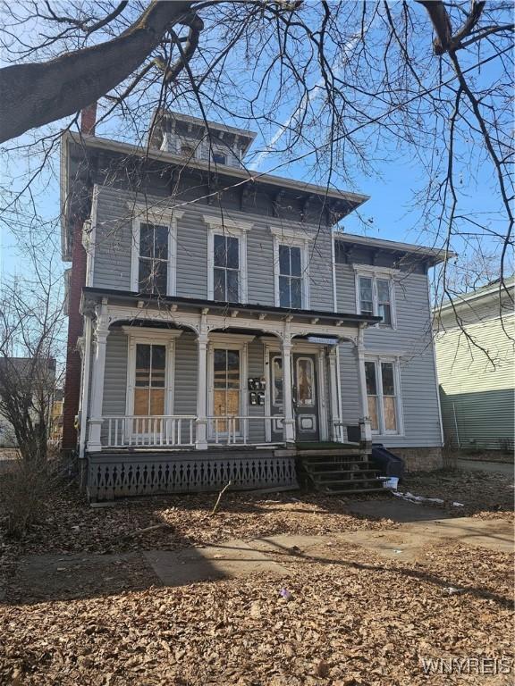 italianate-style house featuring covered porch