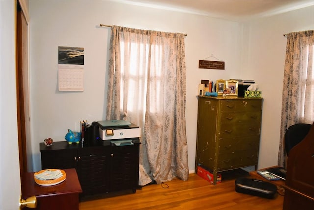 bedroom featuring wood finished floors