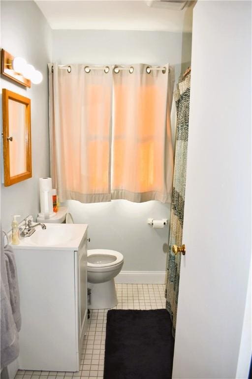 full bath with tile patterned floors, toilet, and vanity