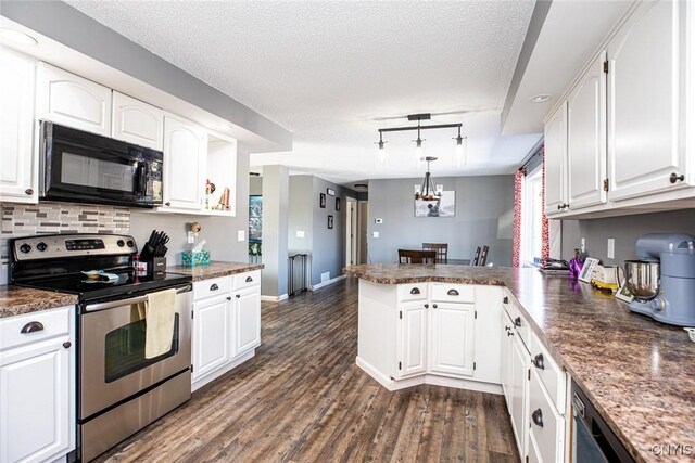 kitchen featuring a peninsula, dark wood-type flooring, white cabinets, electric stove, and black microwave