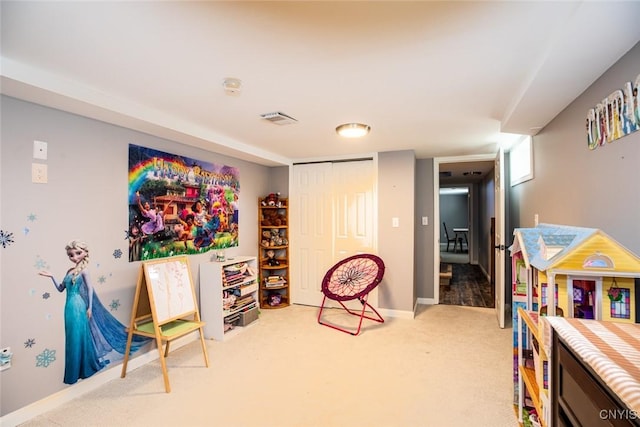 recreation room with visible vents, light carpet, and baseboards