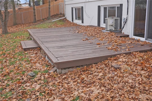 wooden terrace with fence and central AC