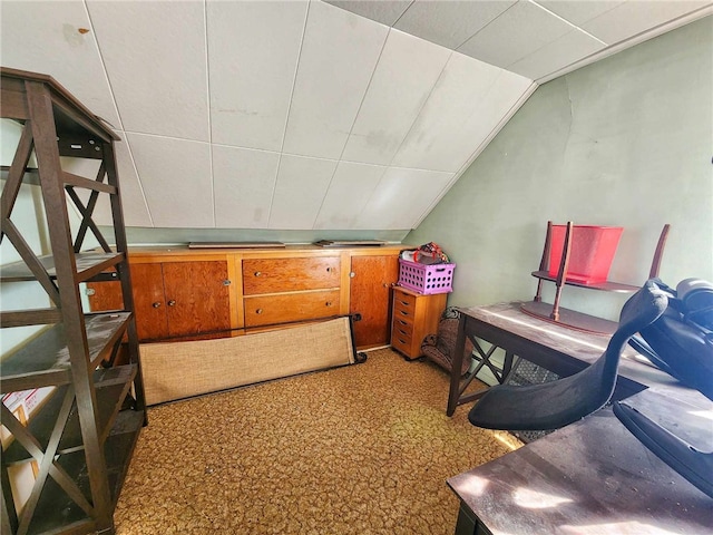 interior space featuring lofted ceiling