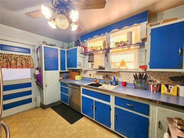 kitchen with a ceiling fan, light floors, a sink, stainless steel dishwasher, and blue cabinets