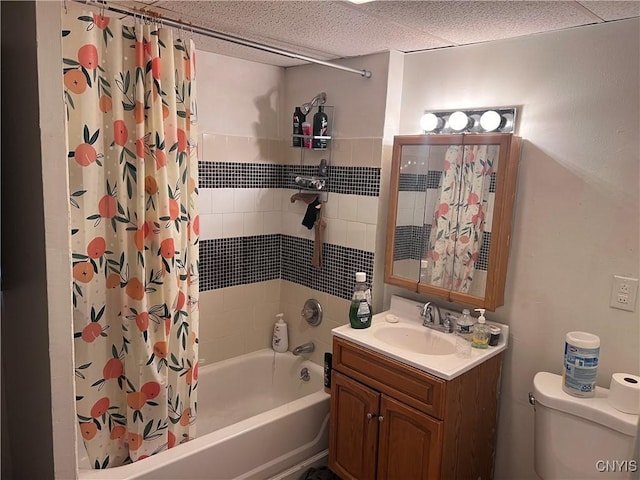 full bath featuring vanity, toilet, and shower / bath combo