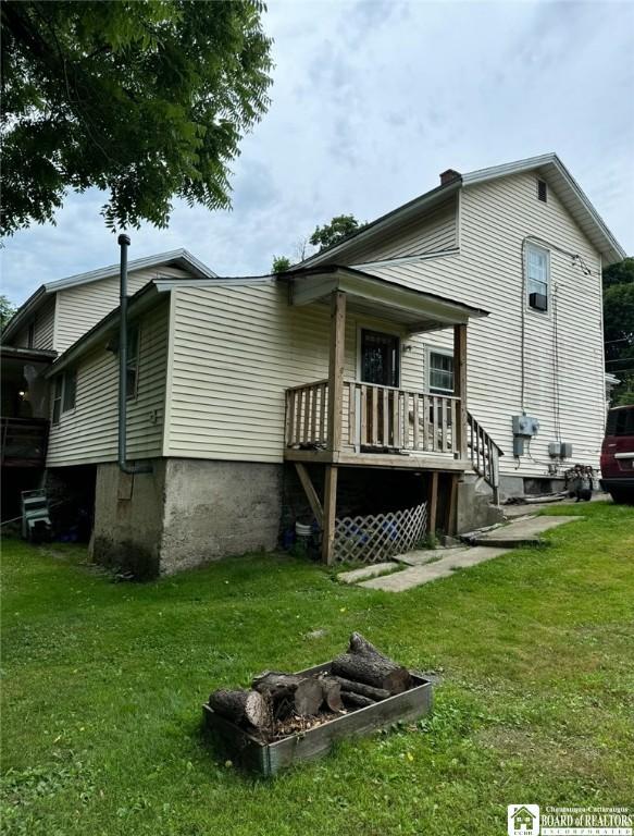 31 Hazzard St, Jamestown, NY 14701 - rear view of property with a yard